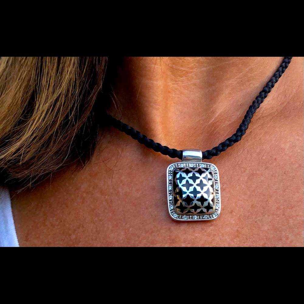 Beautiful sterling silver and black rope necklace